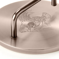 Close-up of the Bronze Fish Weight handle and engraved fish