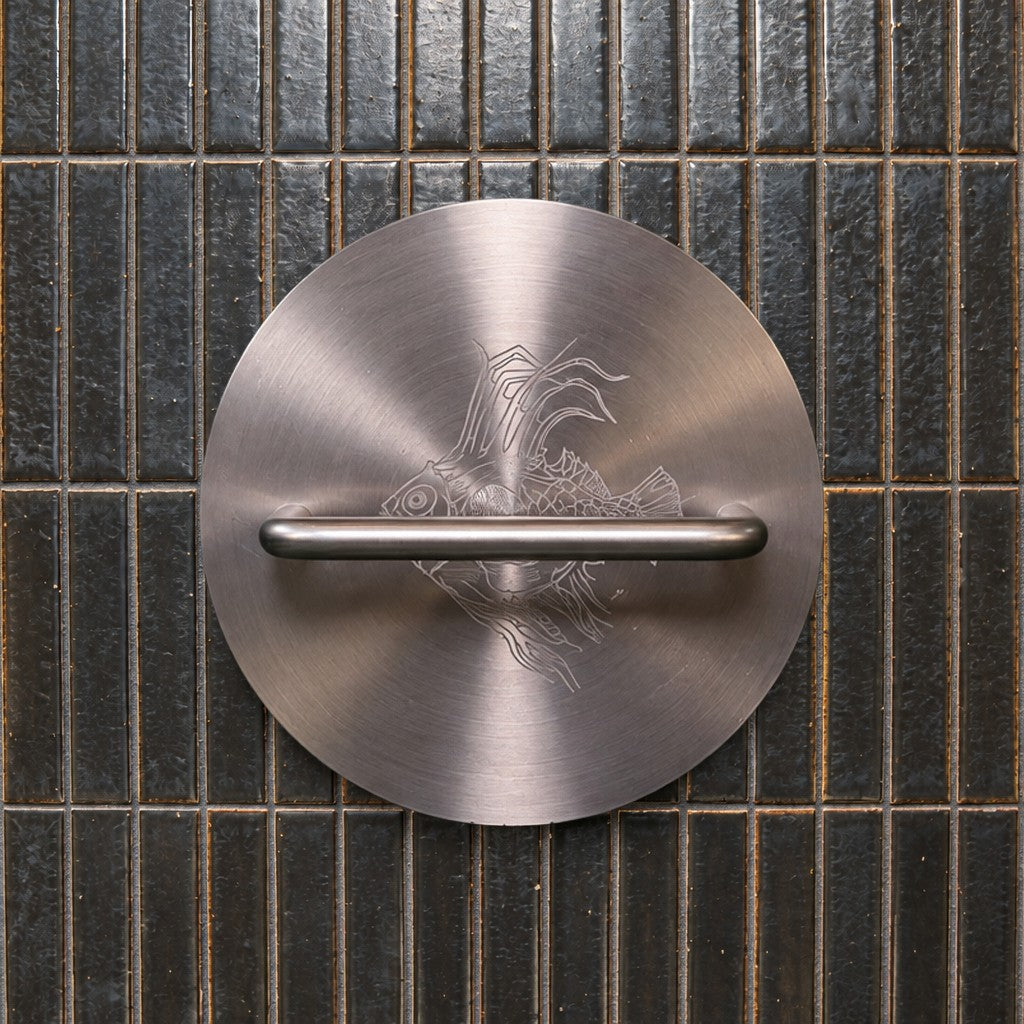 Bronze Fish Weight in a home kitchen